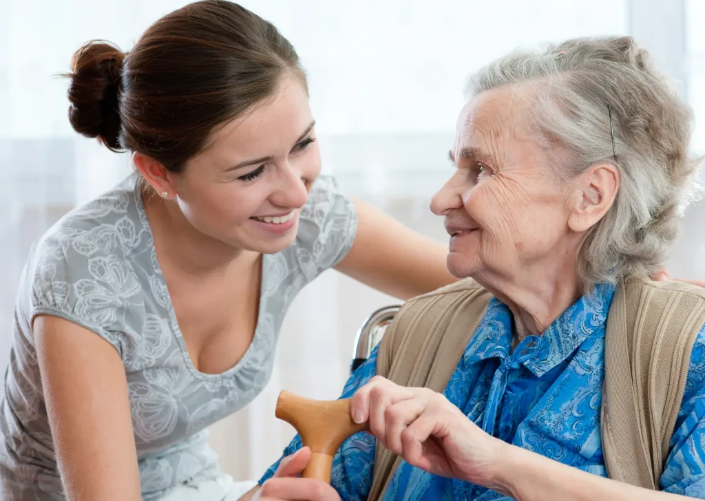 Old woman with caregiver.